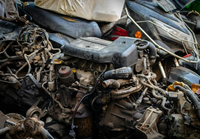 Pile of old car engines and parts
